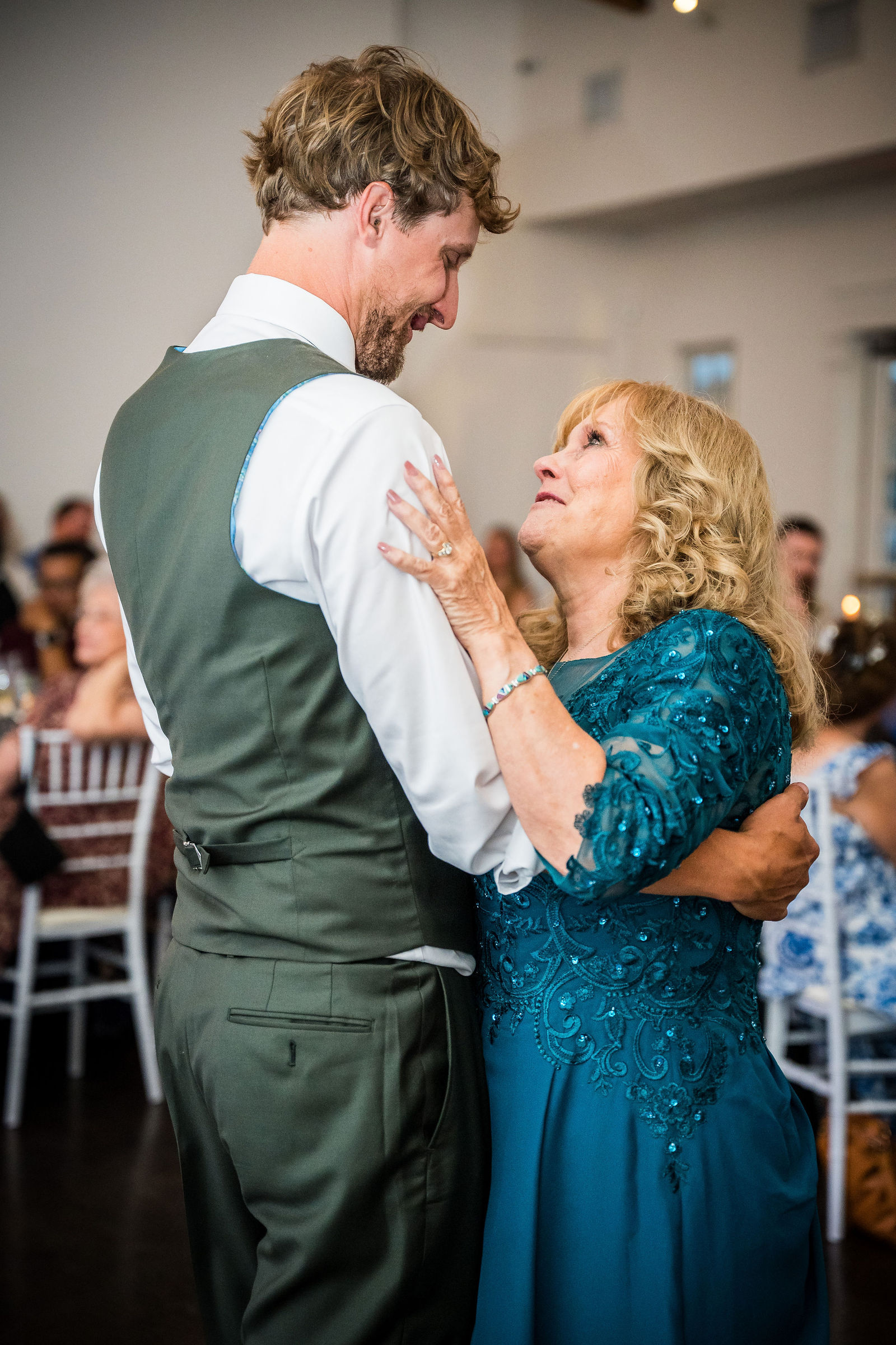 Emotional mother and son dance at a Littleton Colorado wedding