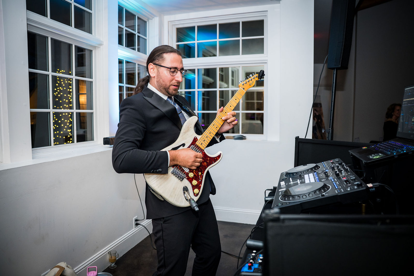Live guitarist playing at a Manor House wedding reception