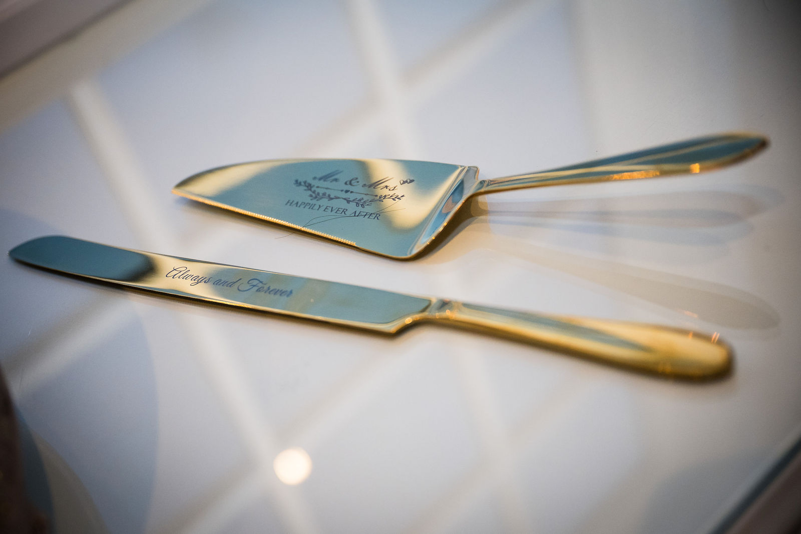 Engraved cake cutting set at a Littleton Colorado wedding