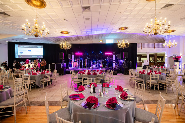 Large event hall with stage and decor