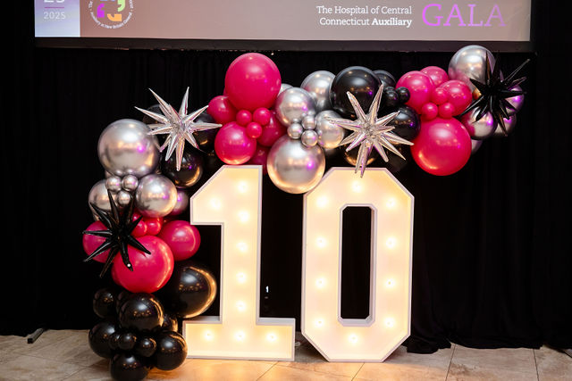 Balloon decor display with a number ten sign