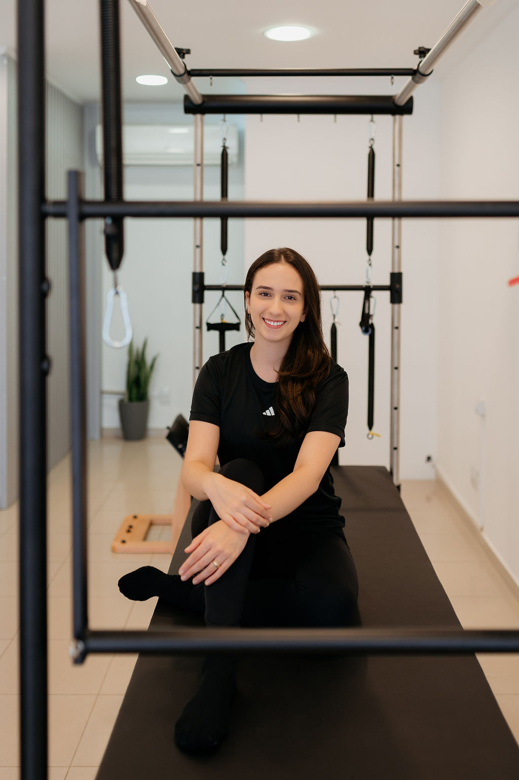 Aluna em prática de Pilates contemporâneo