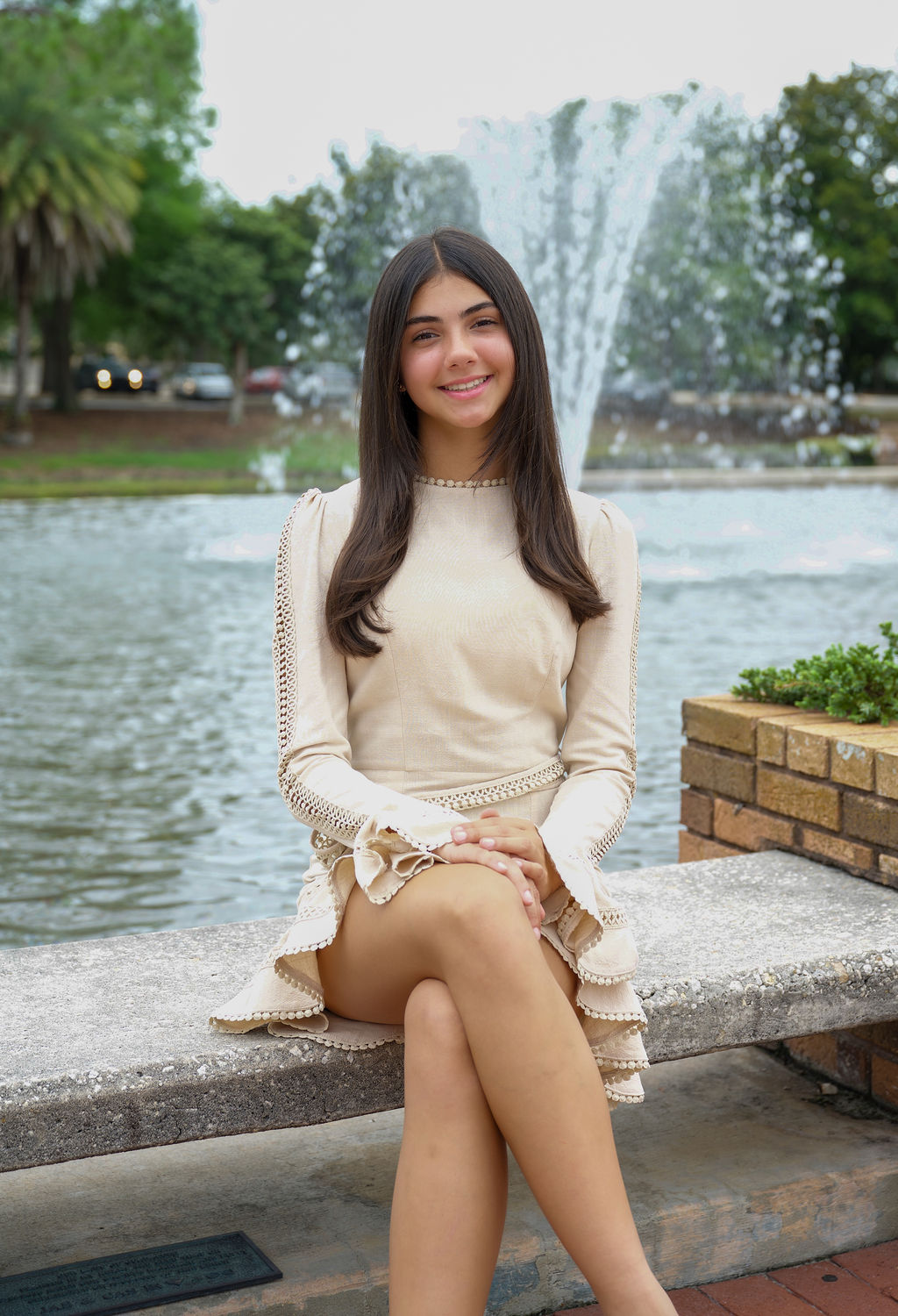 Young adults dressed for a meaningful milestone portrait outdoors