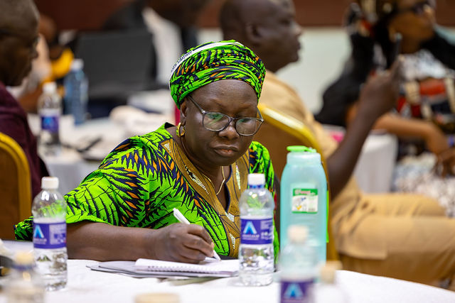 A participant takes notes during discipleship training