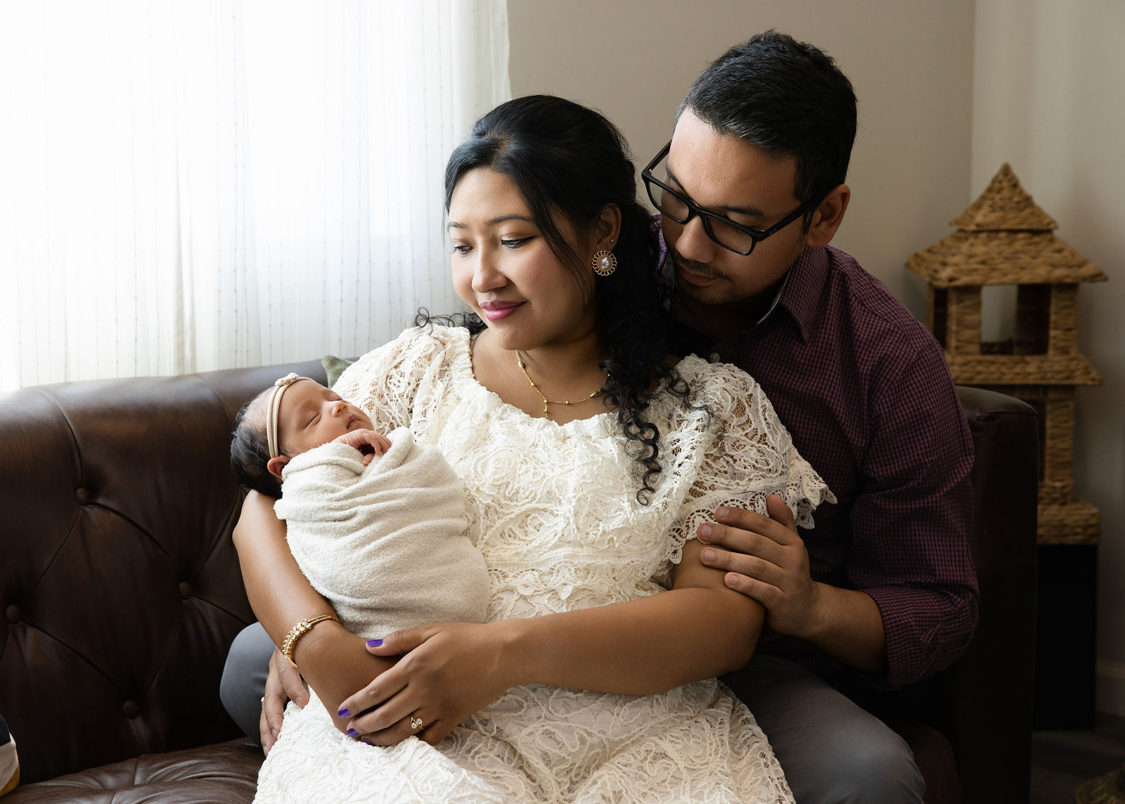 Utah County in-home newborn photos in baby nursery with soft natural window light