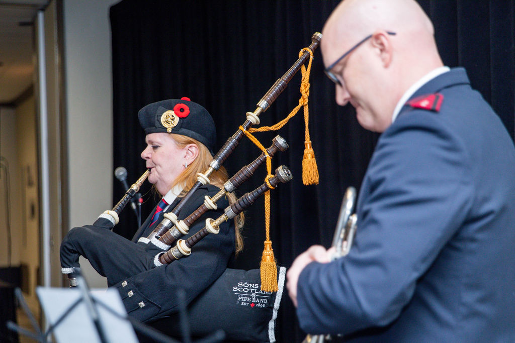 The piper and bugler together