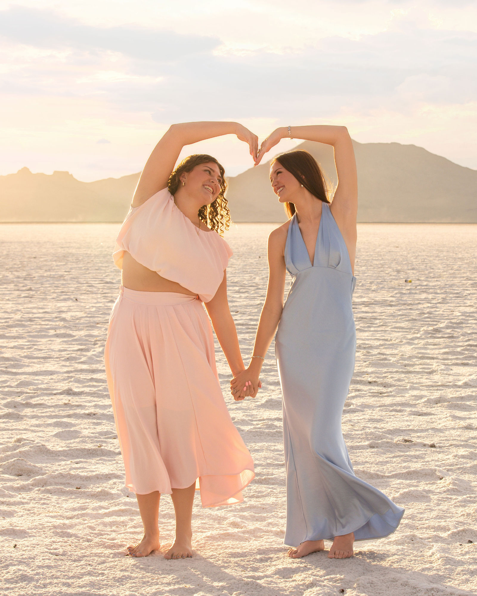 Savannah and Ella laughing during a Salt Flats friendship photography session
