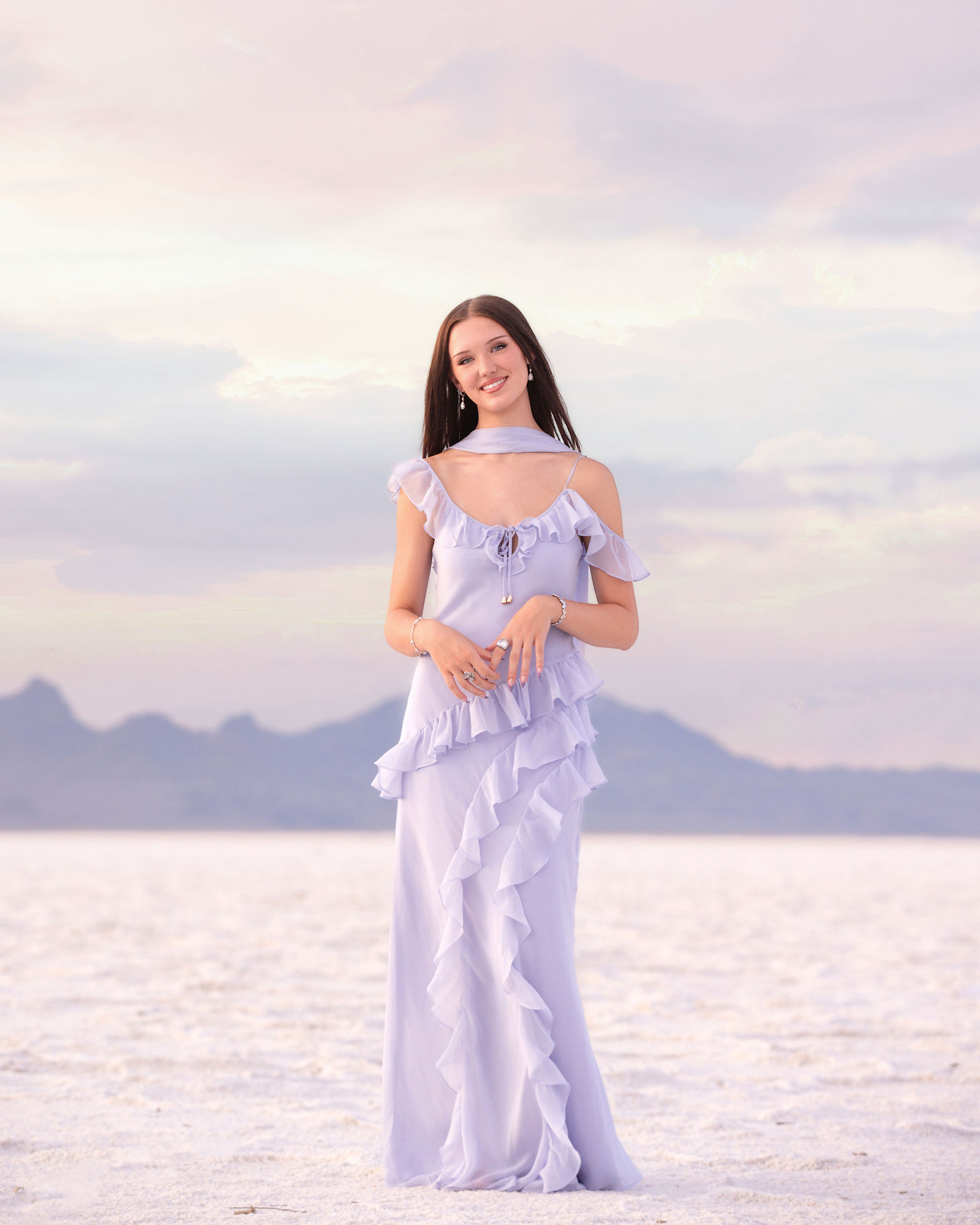 Creative Bonneville Salt Flats senior portrait of Savannah during sunset