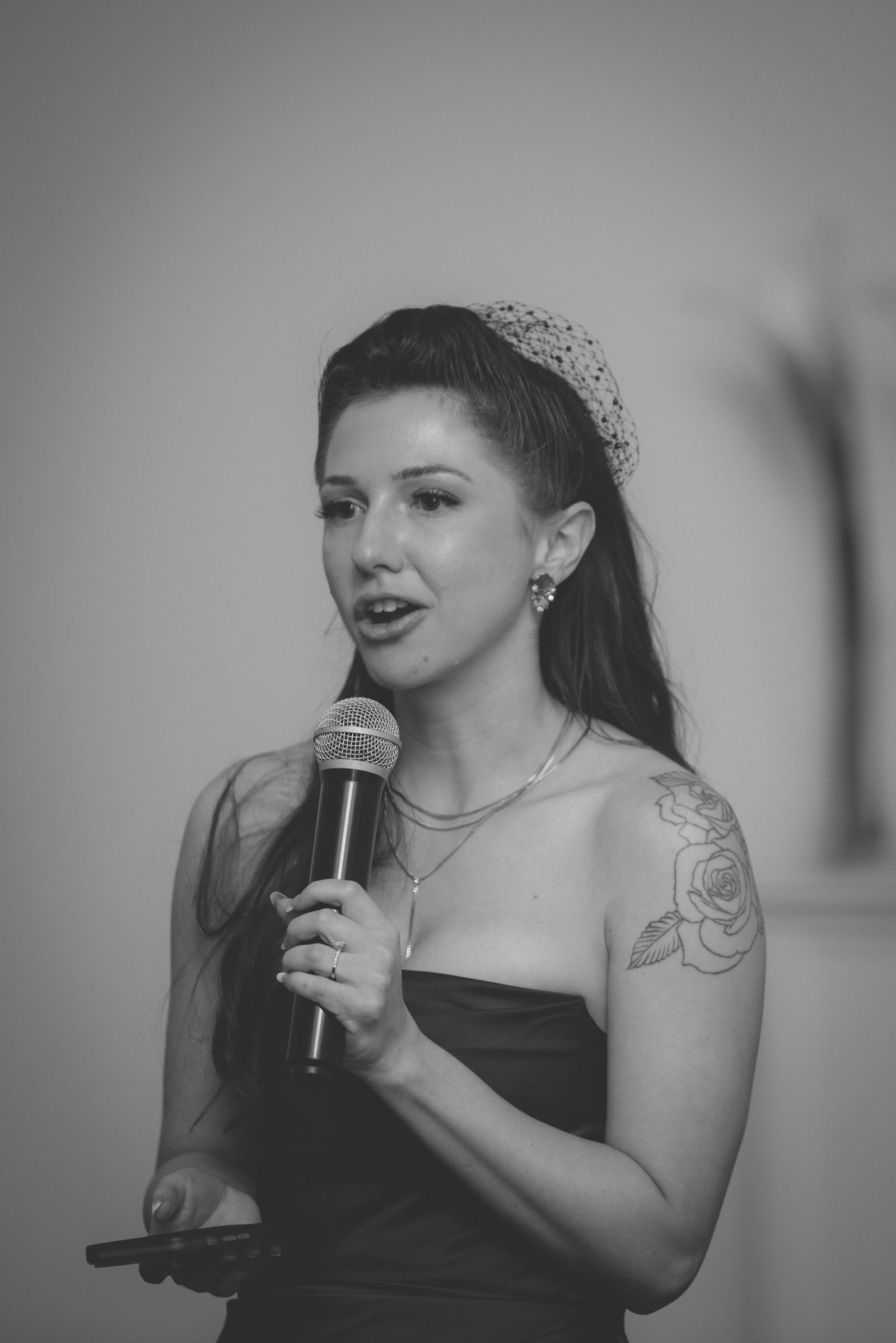 Maid of honor giving a toast during the reception at The Manor House