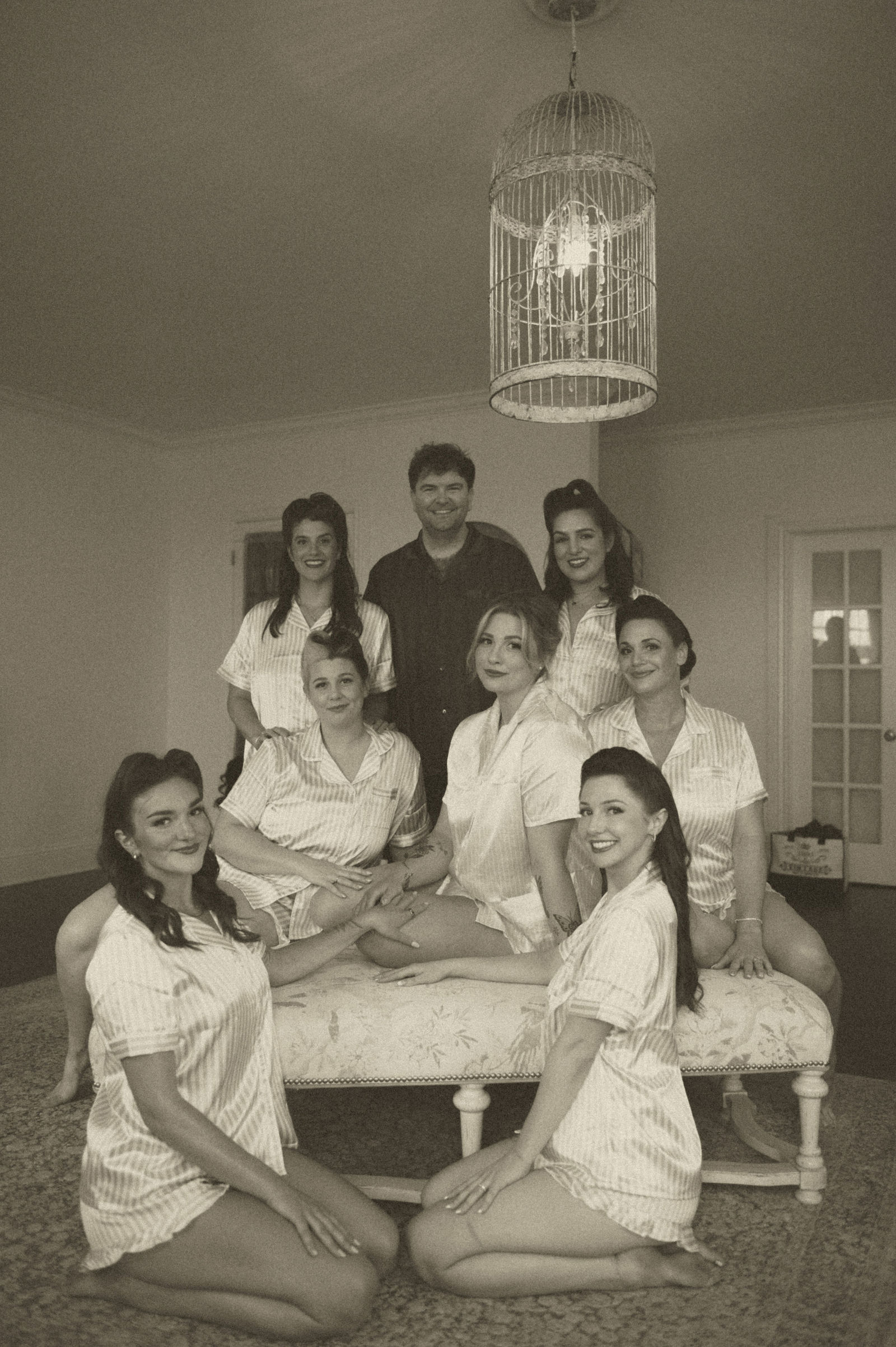 Bridesmaids in matching robes getting ready at The Manor House in Littleton Colorado