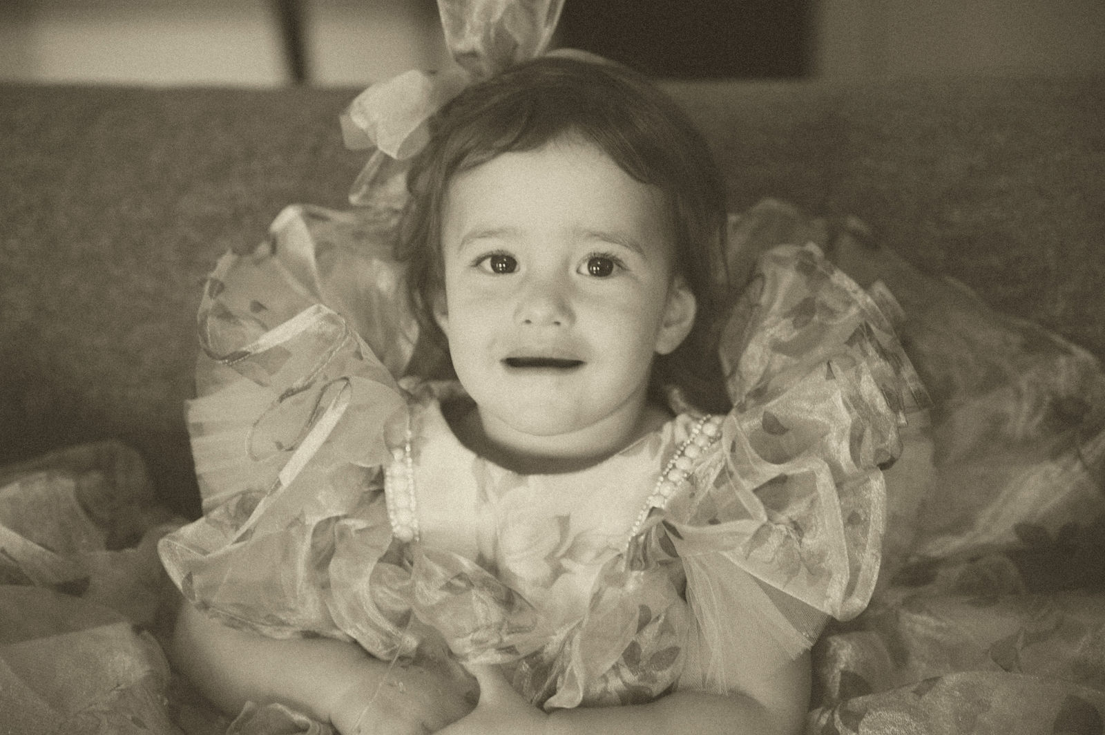 Flower girl portrait in sepia at a Colorado vintage wedding