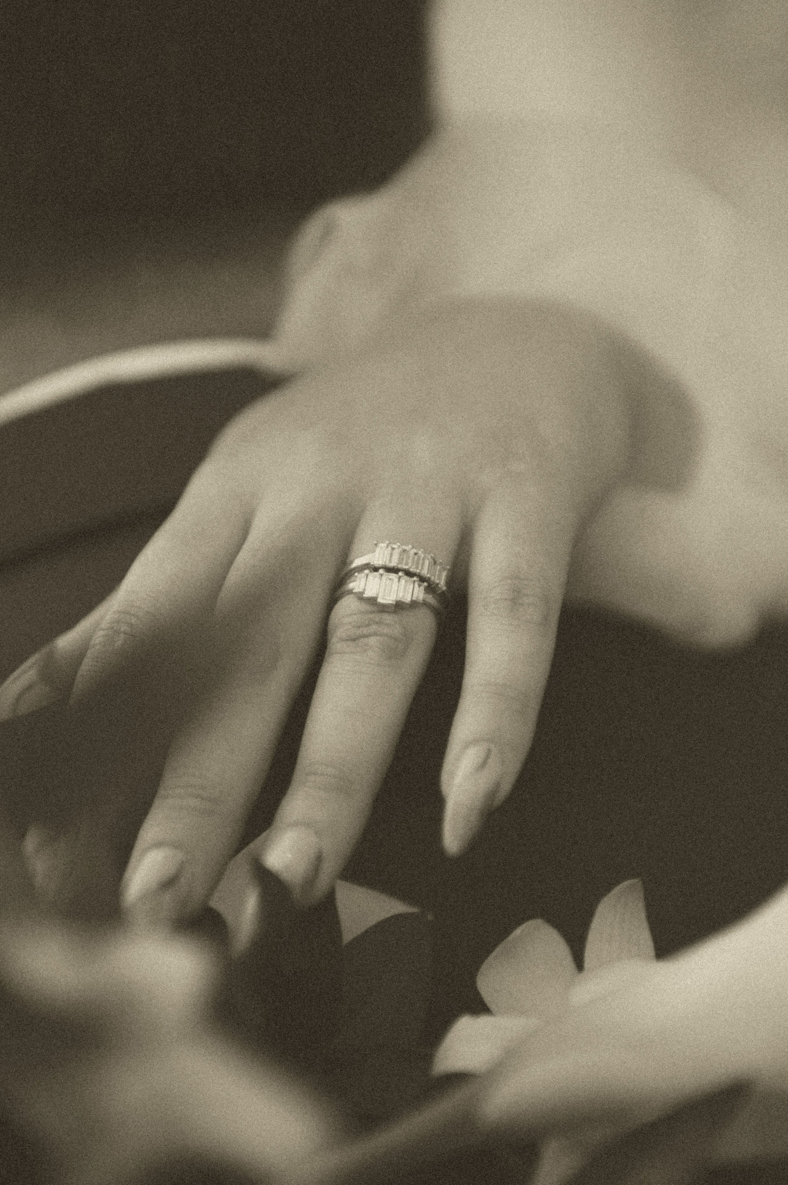 Wedding ring on the brides hand photographed in close detail