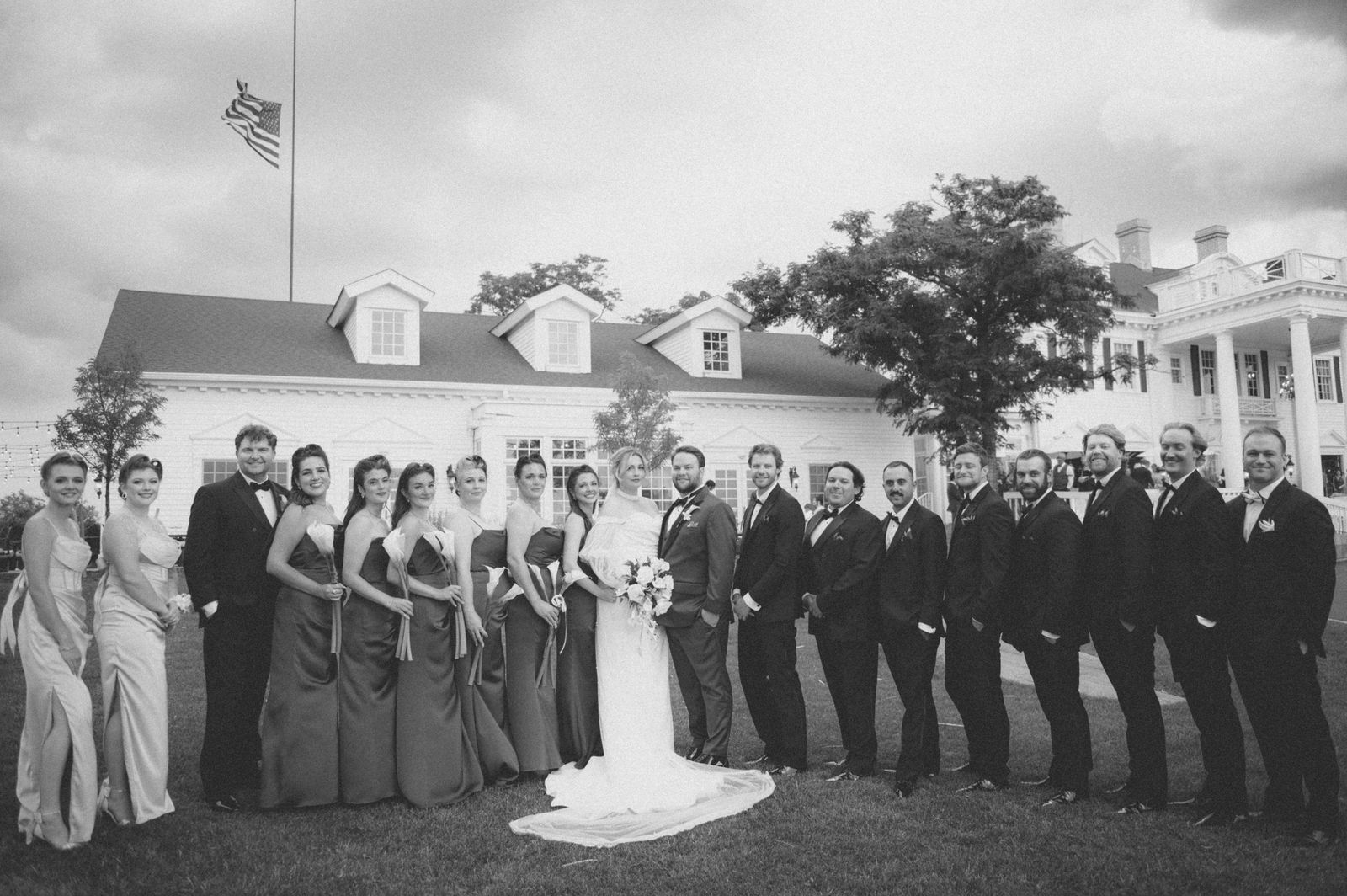 Full wedding party in front of The Manor House in Littleton Colorado