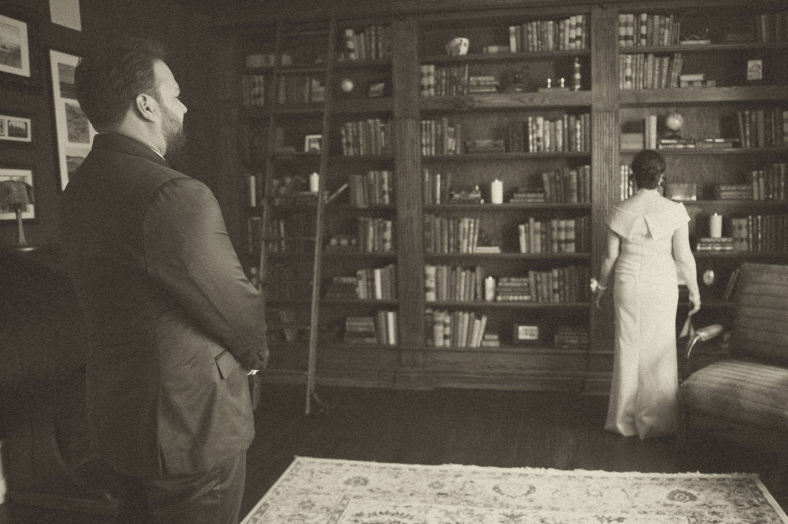 The wood paneled library at The Manor House Littleton photographed in sepia