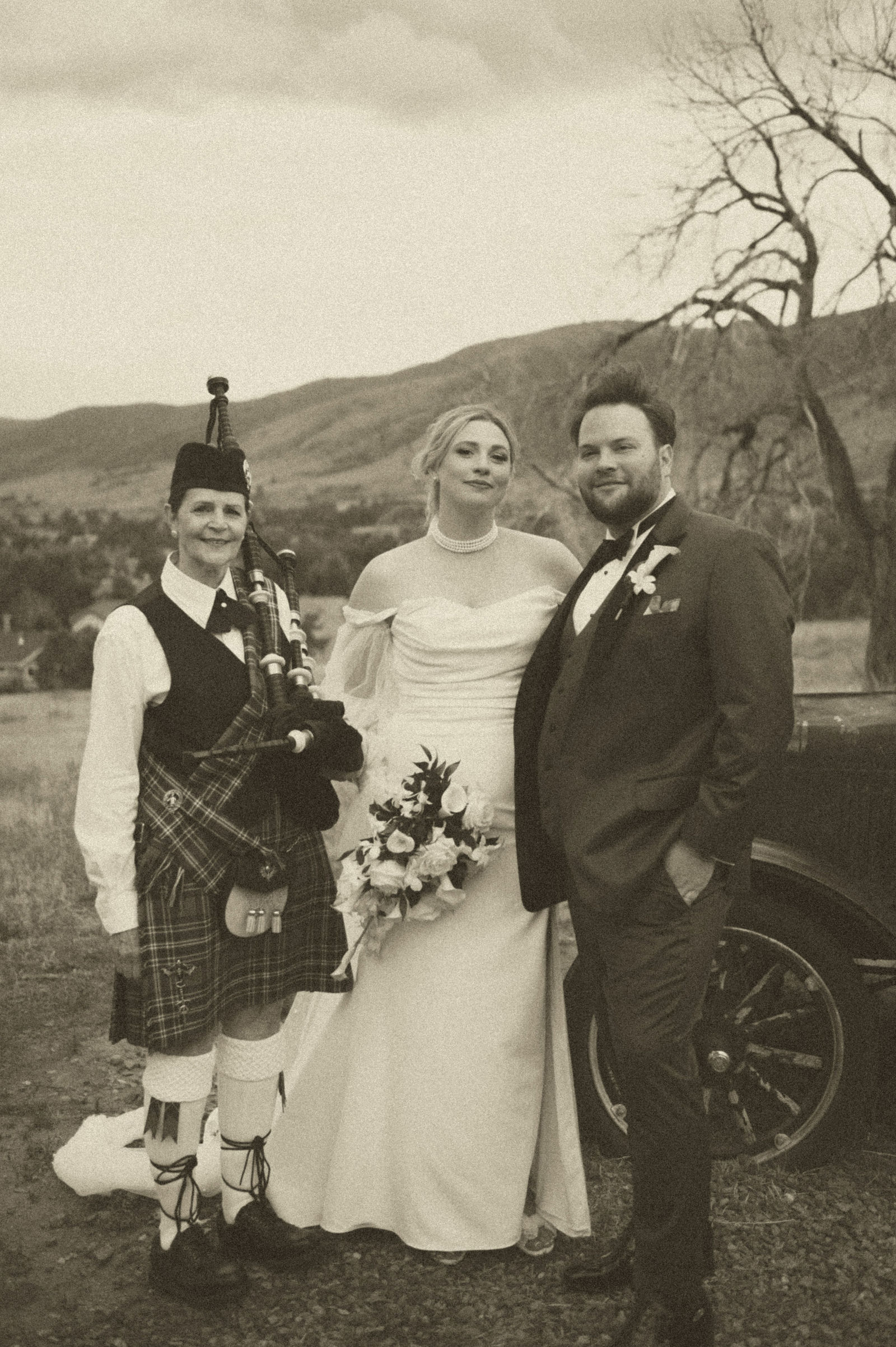 Bagpipes leading the bride and groom at their Colorado wedding