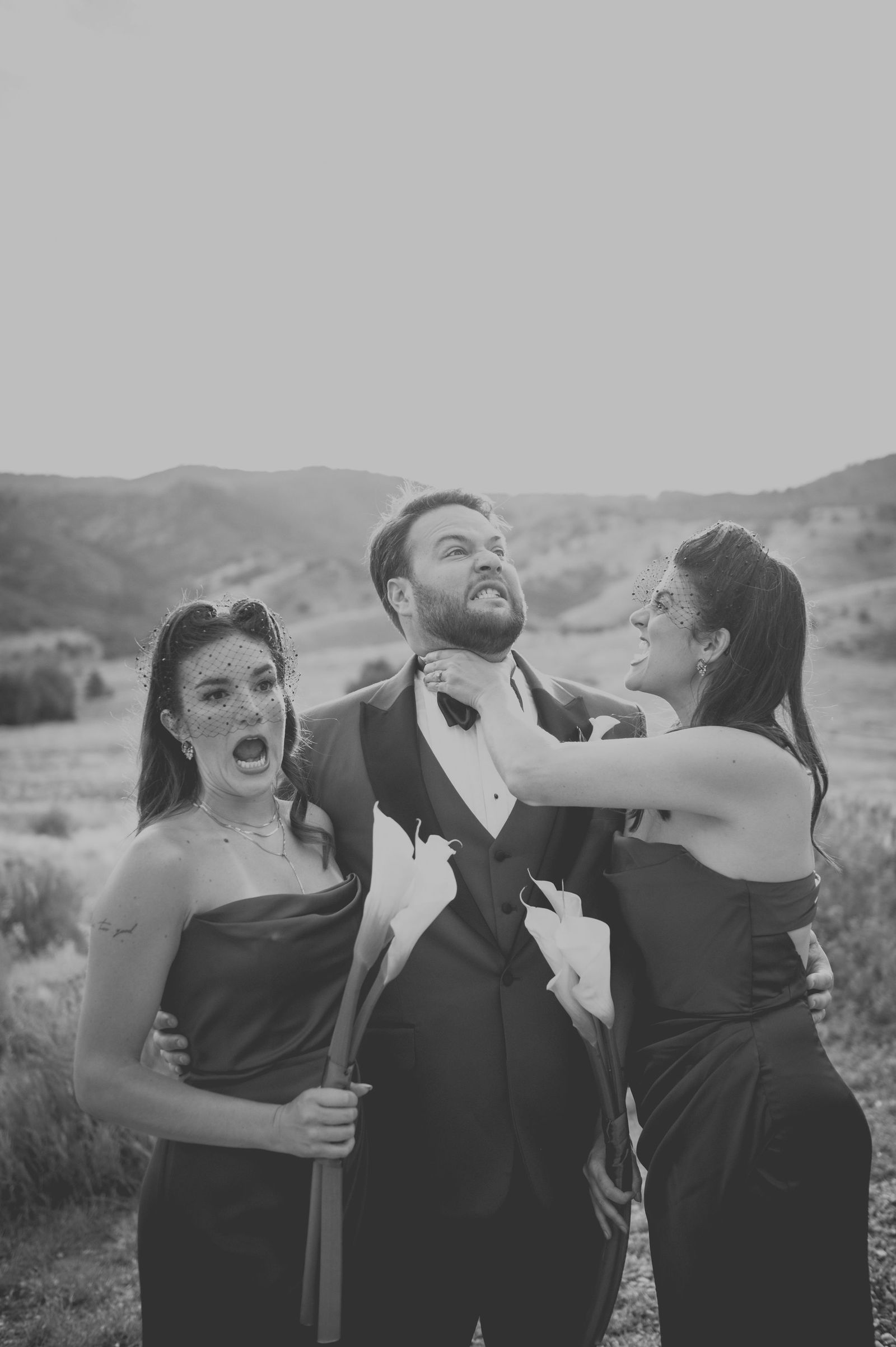 Family laughing together during portraits at The Manor House