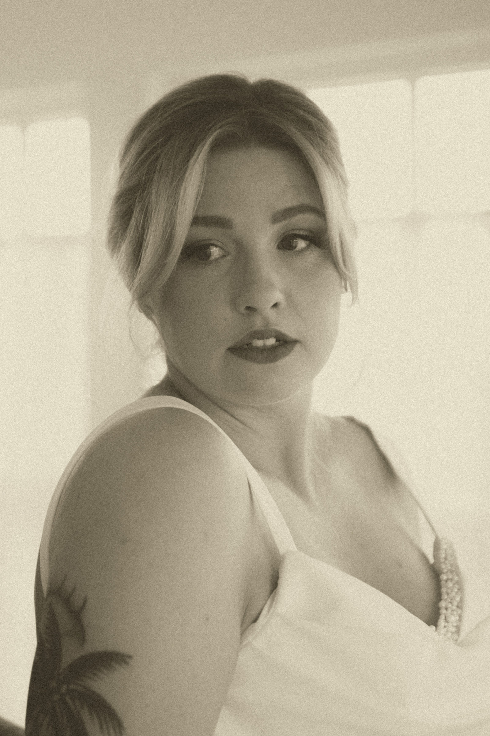 Classic 1940s inspired bridal portrait in sepia at The Manor House Colorado