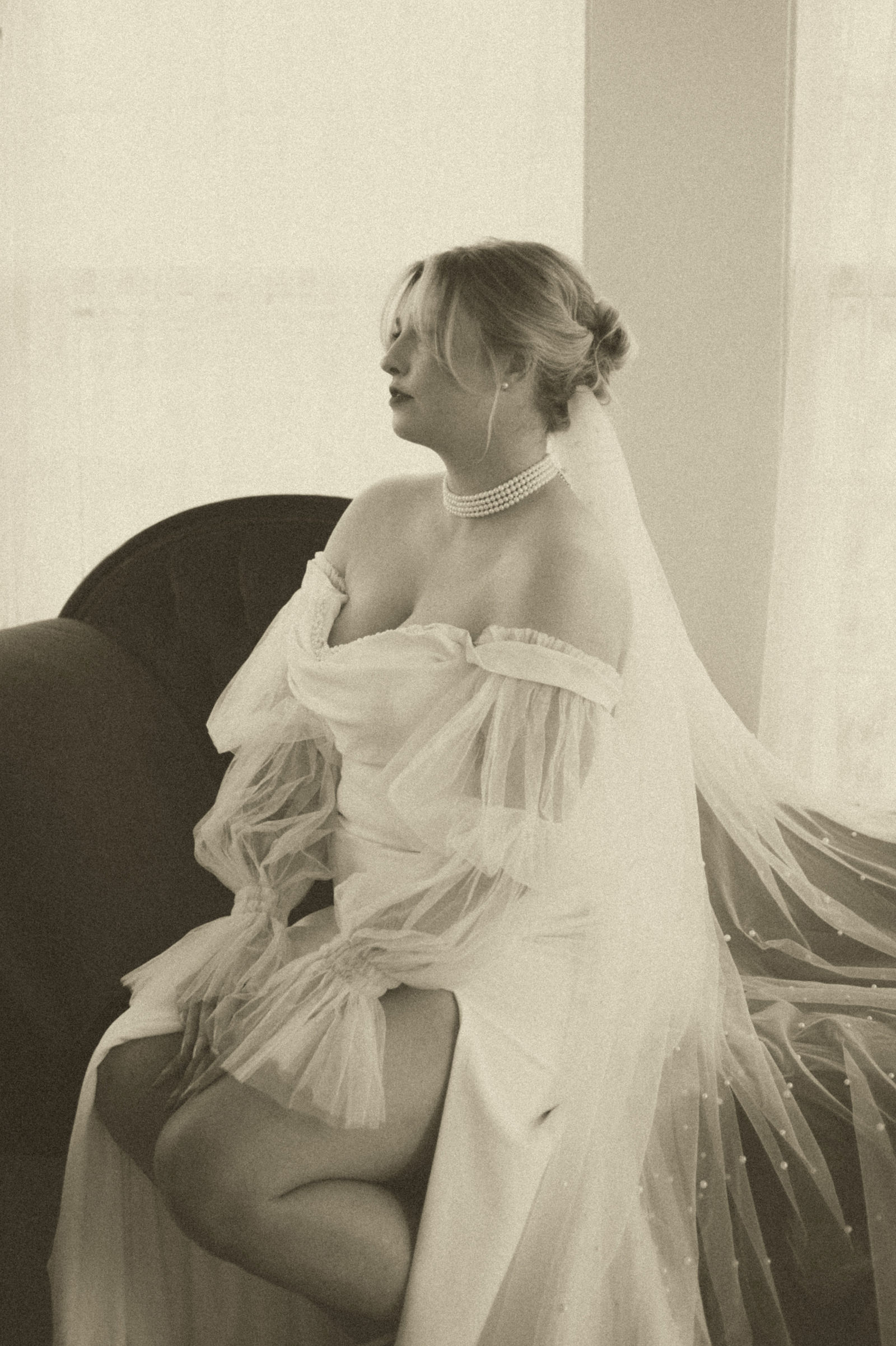 Backlit veil portrait of the bride edited in old Hollywood sepia