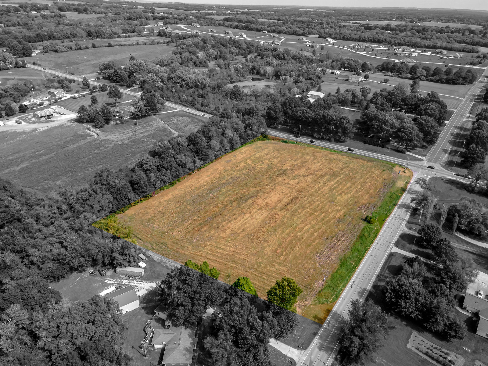 E Pink Hill Rd & S Buckner Tarsney Rd by KC Home Photography