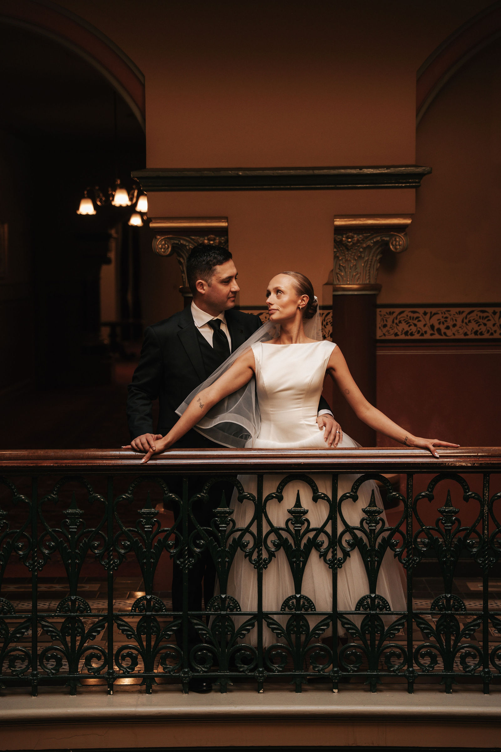 Couple exchanging vows in front of a small group