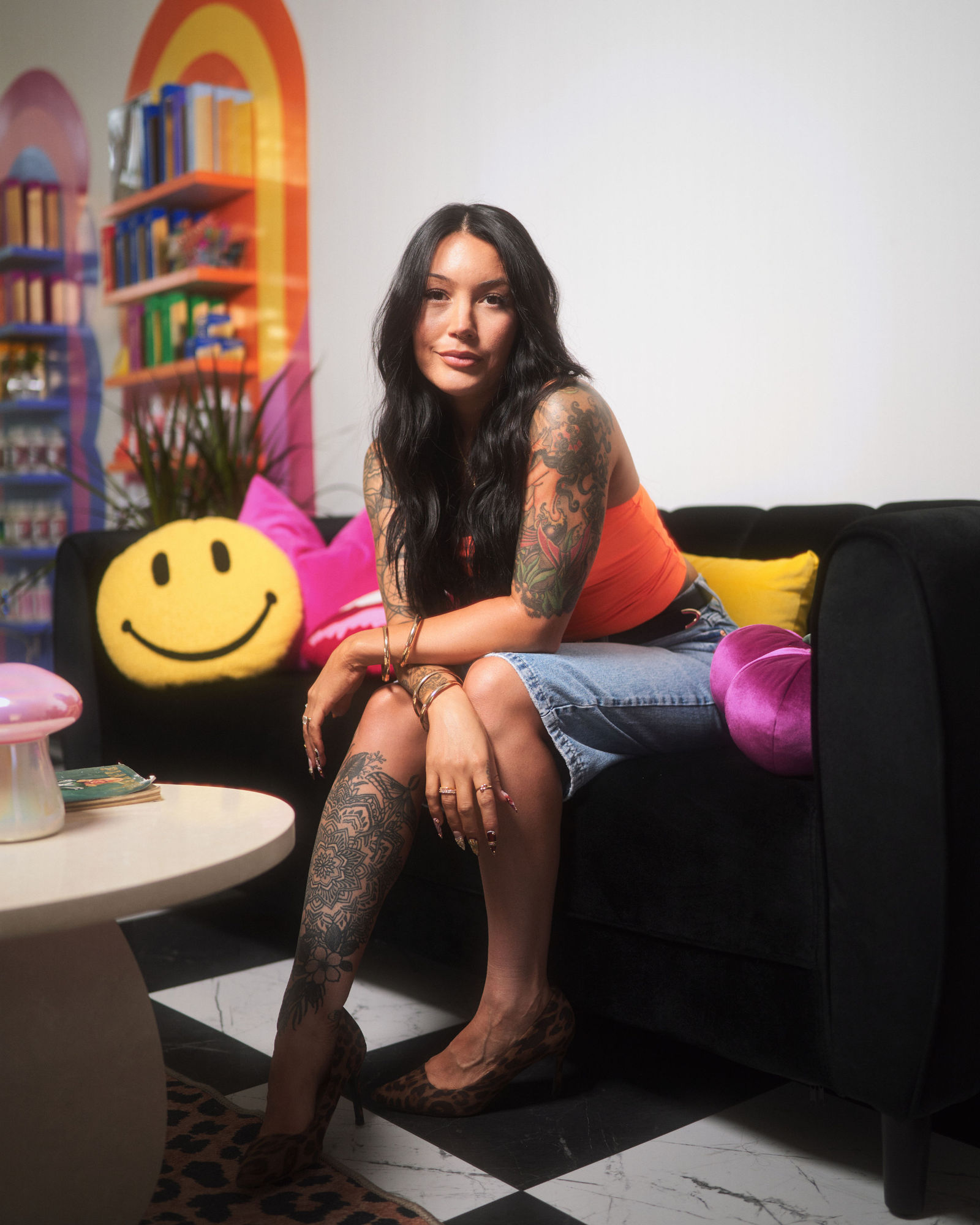 Personal branding portrait in a colorful salon with polished flash lighting