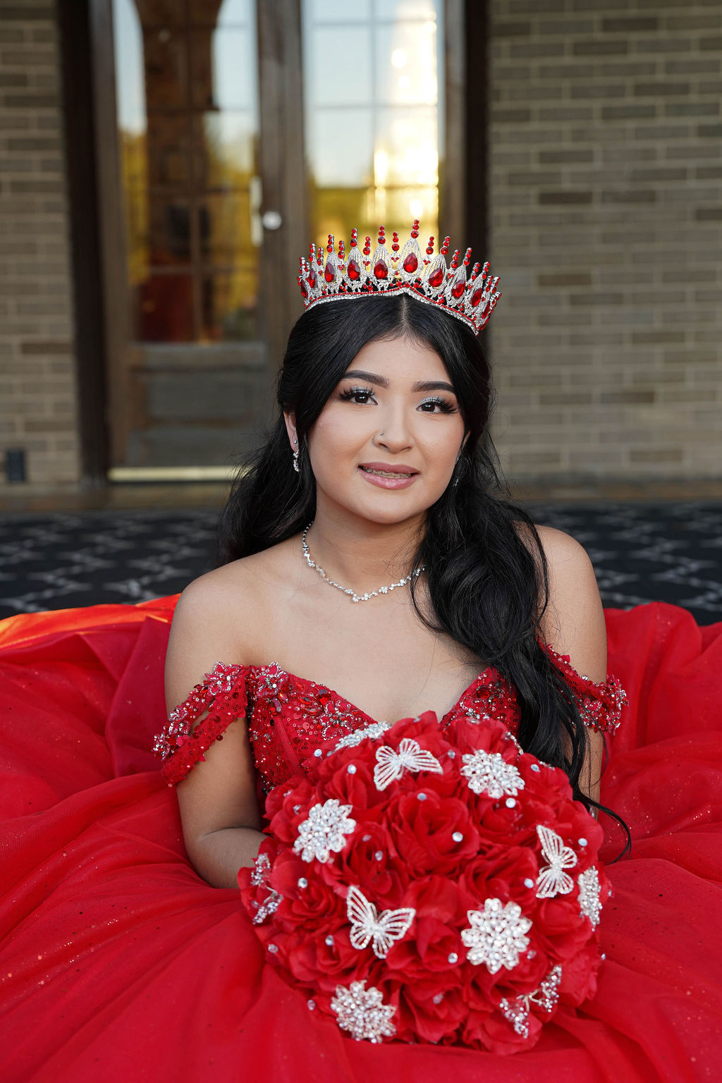 Merahy posing outdoors during her quinceañera session