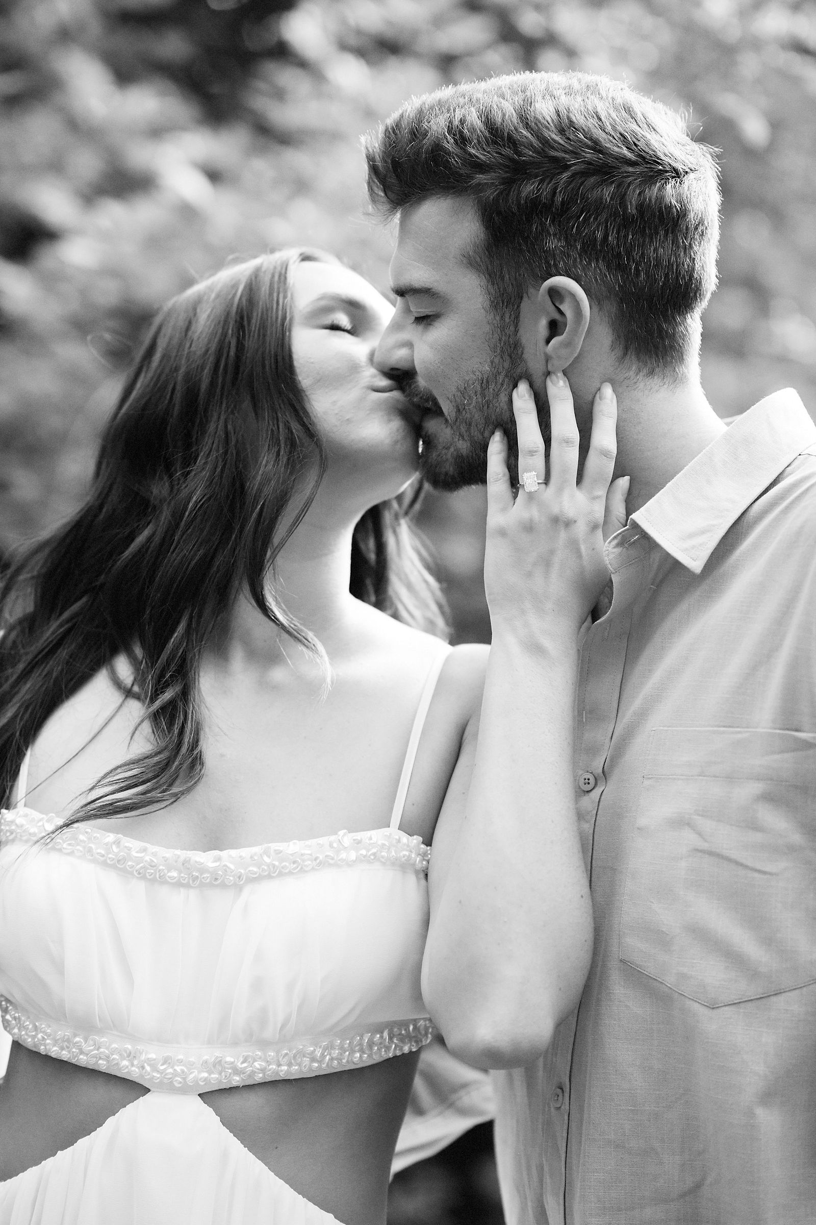 An intimate black-and-white engagement portrait