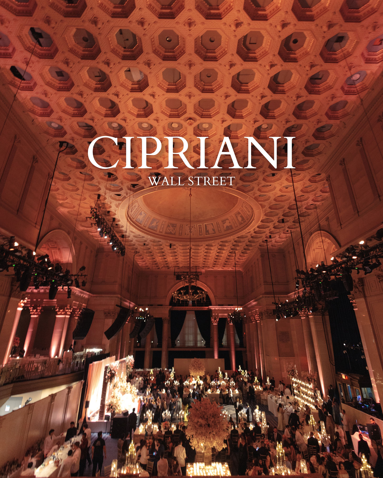 A full-height view of the illuminated reception hall and coffered dome, with the original Cipriani Wall Street lettering across the photograph.