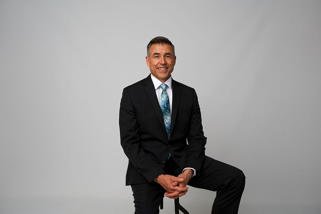 Approachable corporate headshot of John Marek