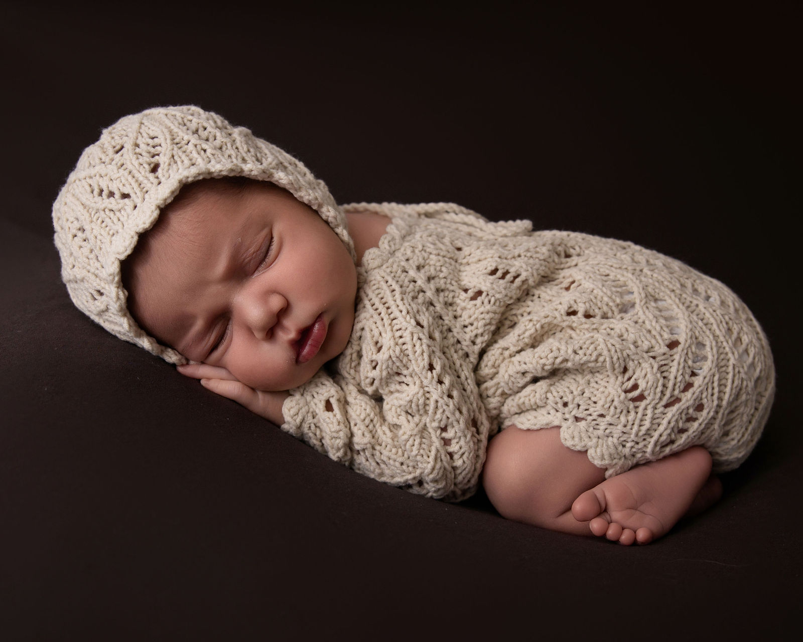 Farmington newborn photographer serving Davis County families with studio and in-home newborn sessions