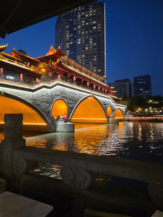 Chengdu — golden-lit bridge at night