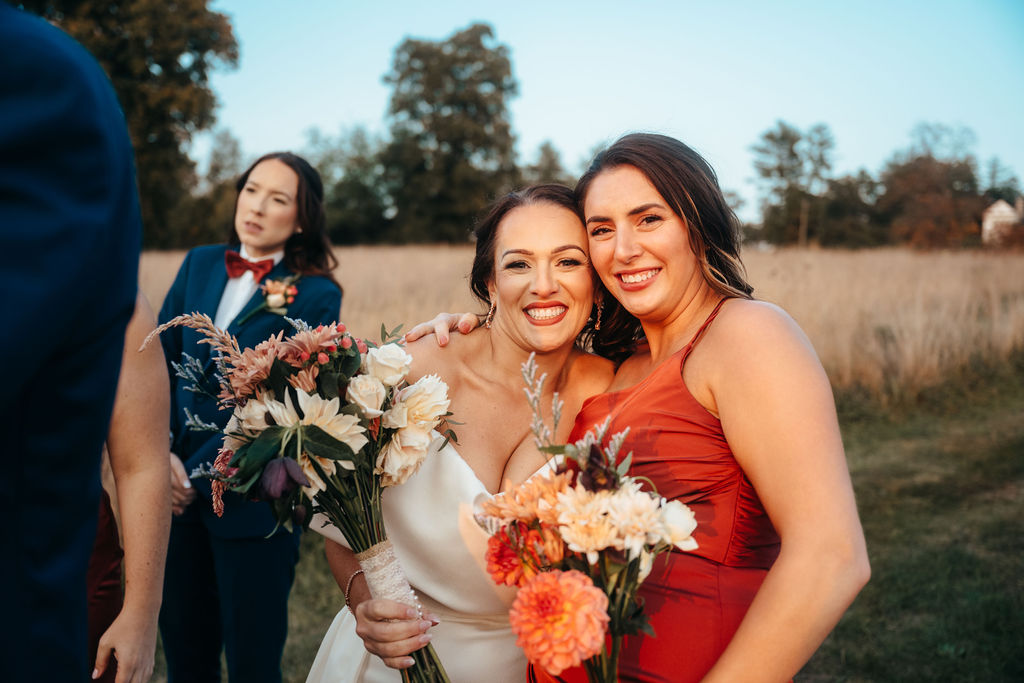 Samantha with her bridesmaid at cocktail hour