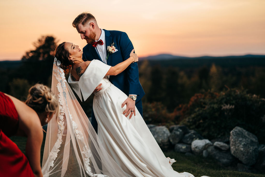 Samantha and McCallum embracing at sunset