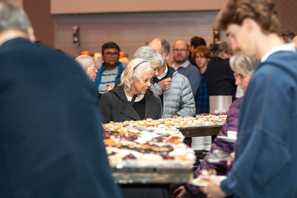 Guests at the dessert table