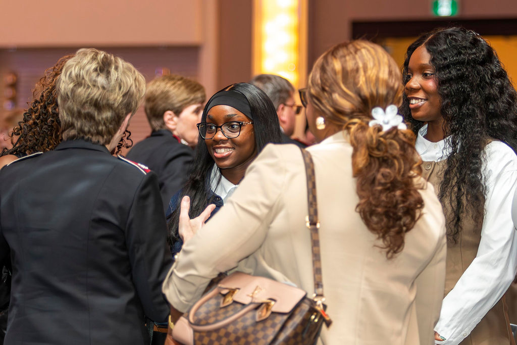 Guests chatting at the reception