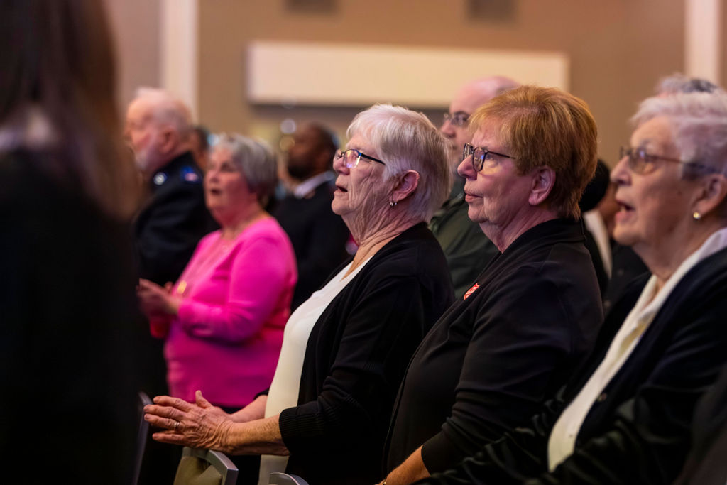 Guests singing during worship