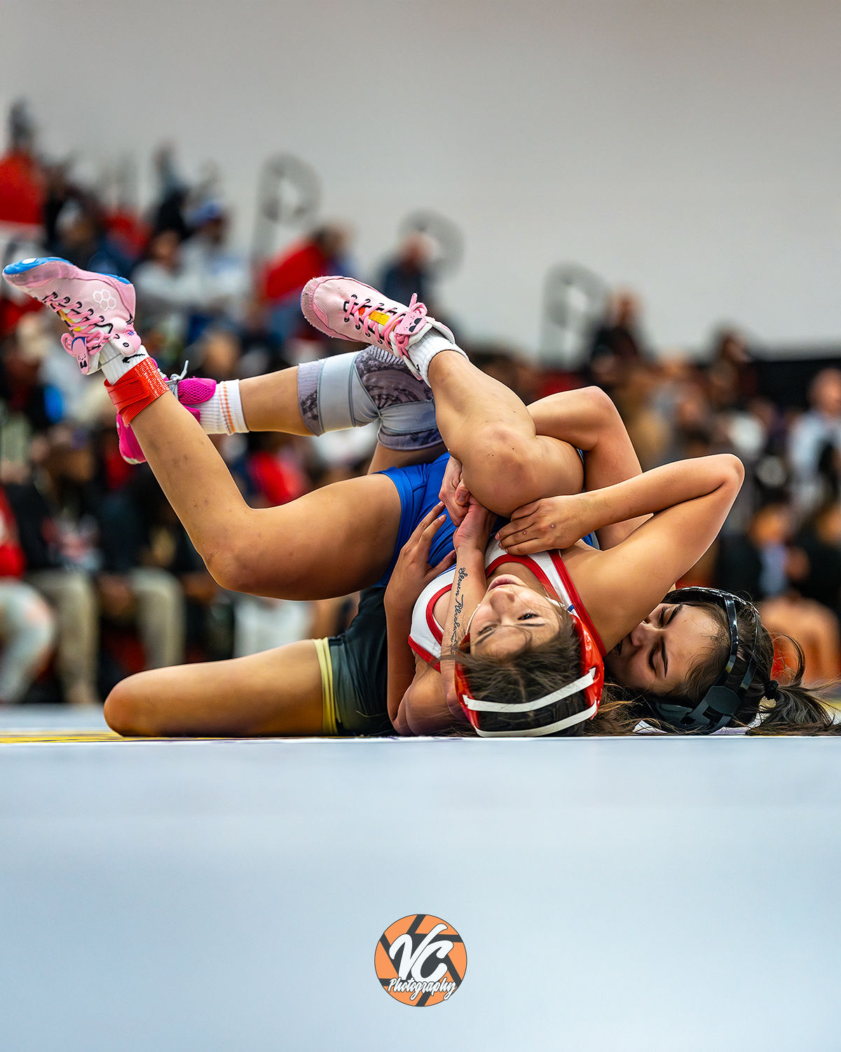 Wrestling action photography at Comal Canyon with Johnson athletes competing