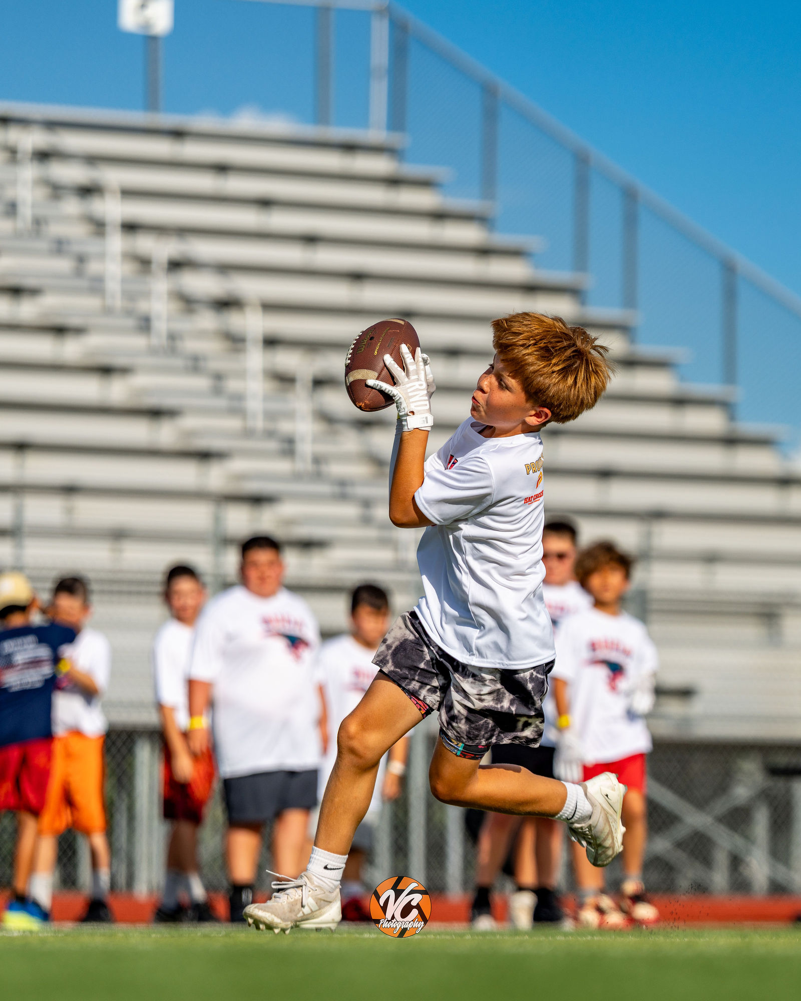 Jr Jags Football and Cheer camp documented by Buda sports photographer