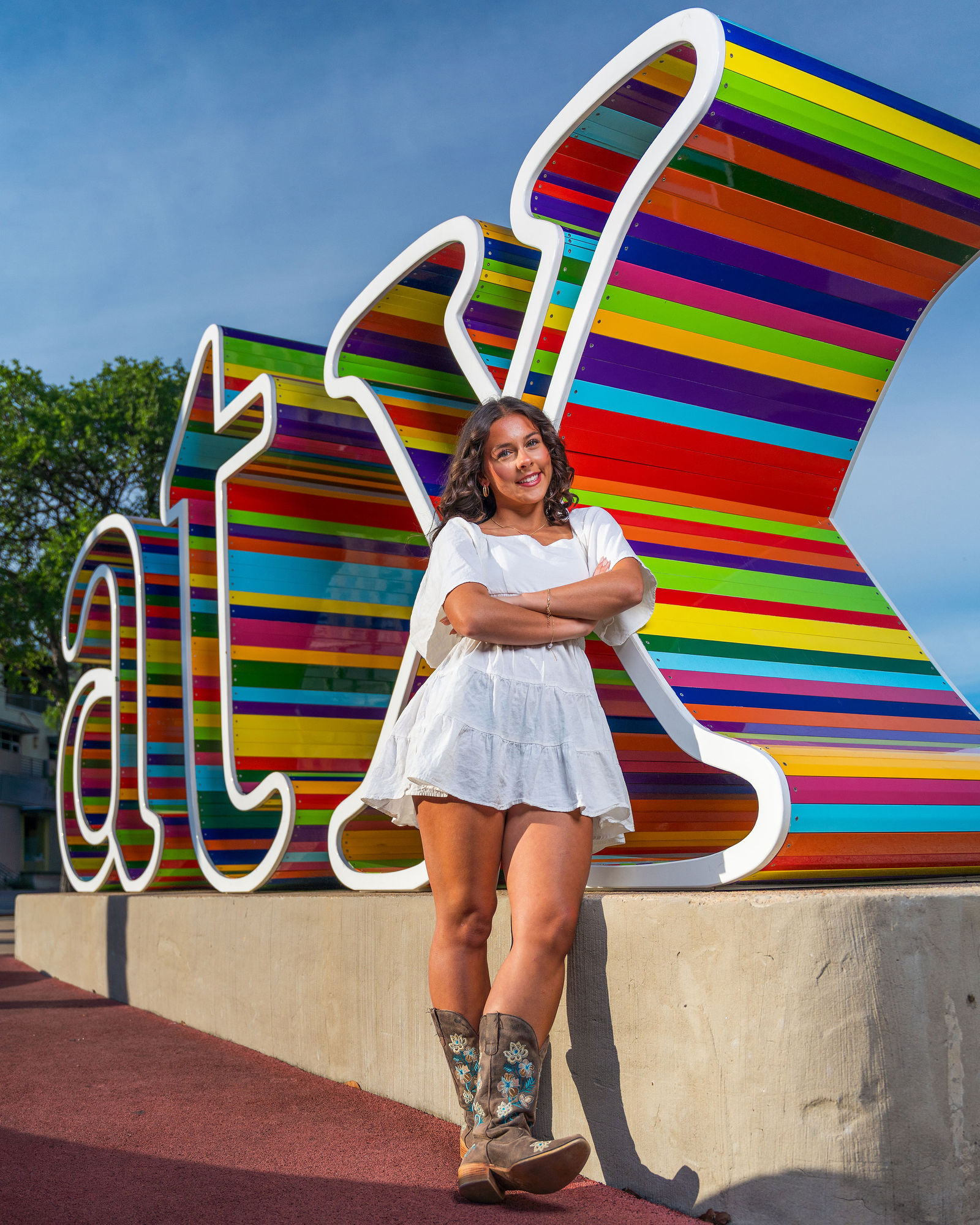 Peyton and Jesse creative portrait session near the ATX Sign in Austin Texas by VC Photography
