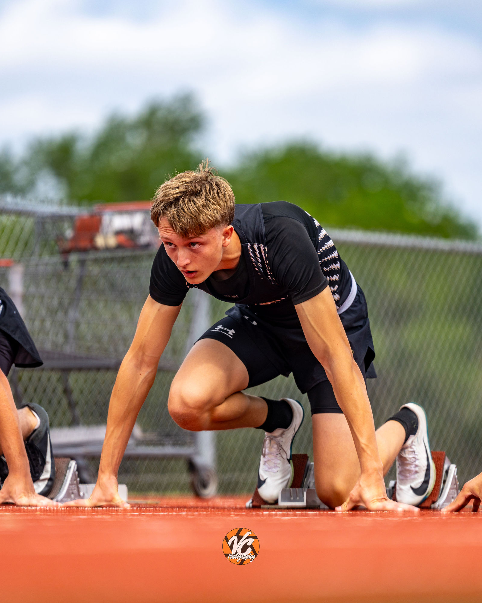 Johnson Jaguars track athlete competing in running event