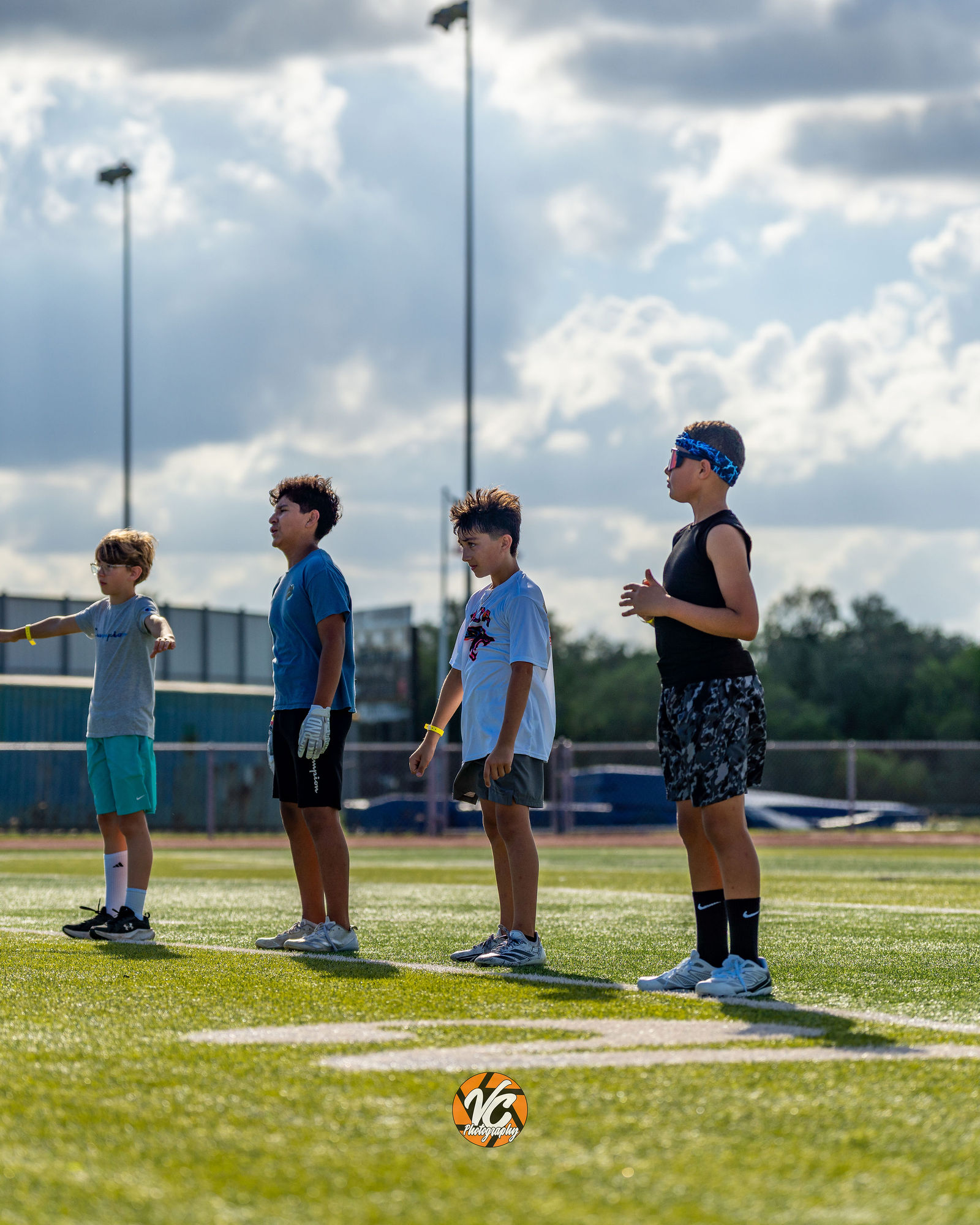 Jr Jags football camp movement and sideline energy in Buda Texas