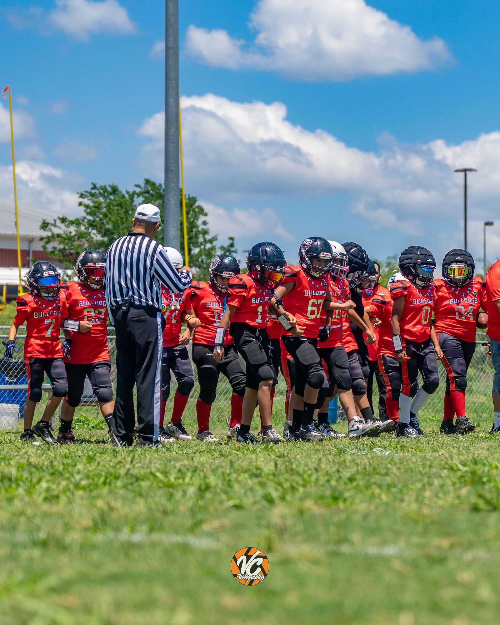 10U Bulldogs football action photo during a competitive youth football game in San Marcos
