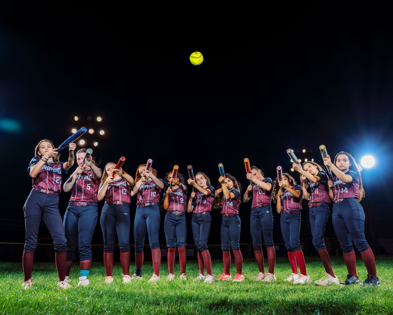 Drip Select Softball athlete portrait in Dripping Springs by Austin sports photographer VC Photography