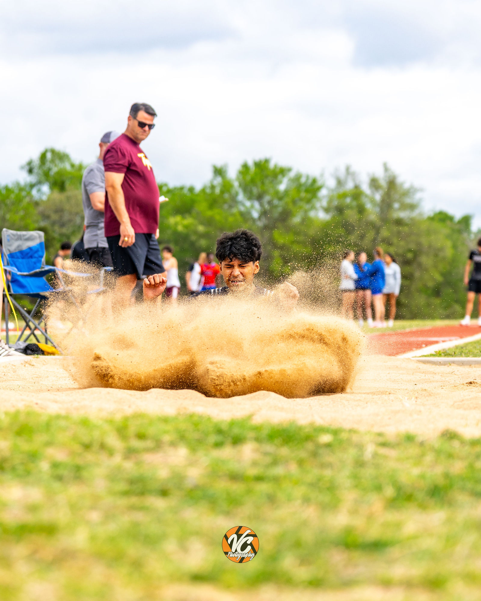 Johnson Jaguars track athlete sprinting during high school running event