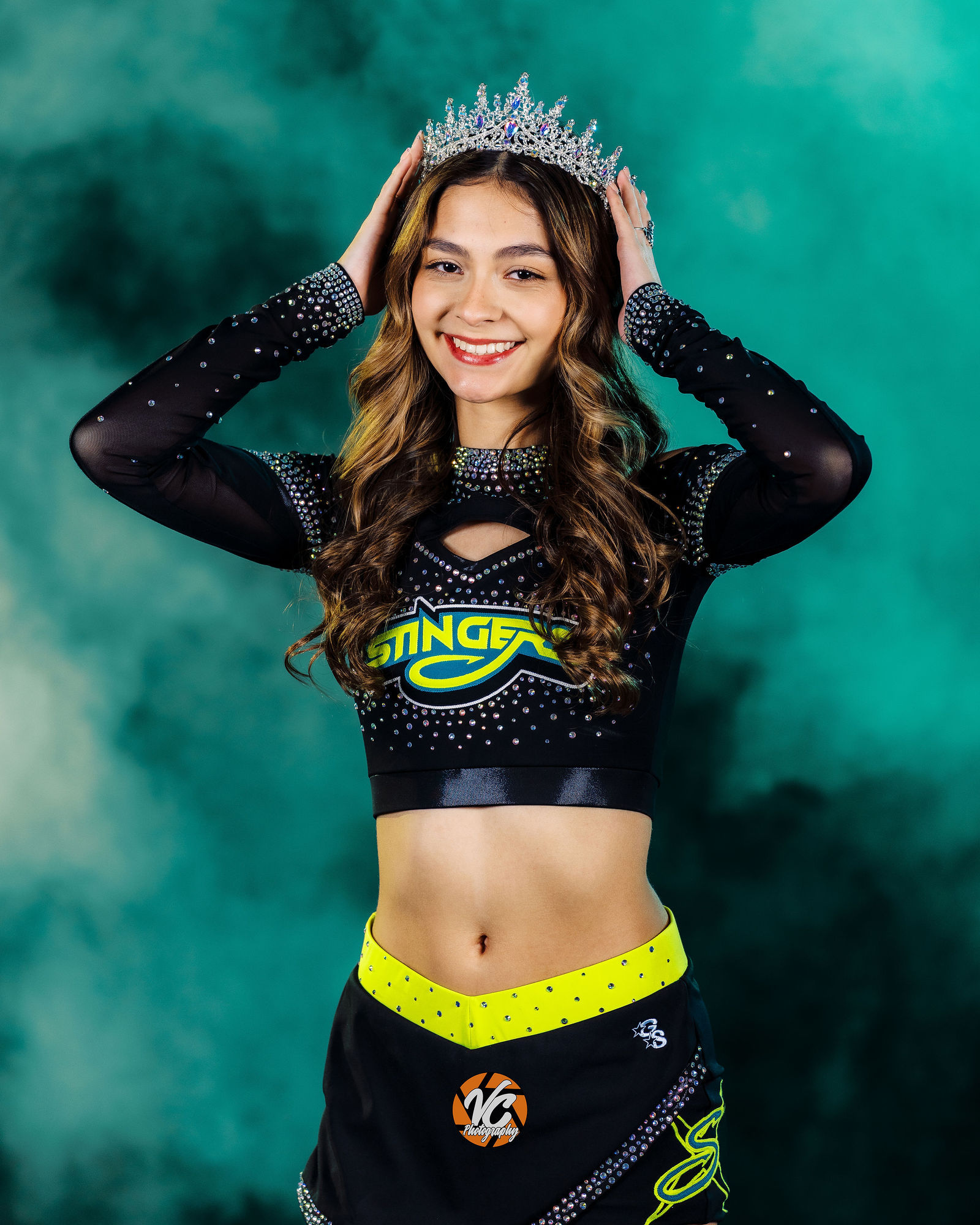 Central Texas cheer team photos with cinematic smoke and bold lighting by VC Photography