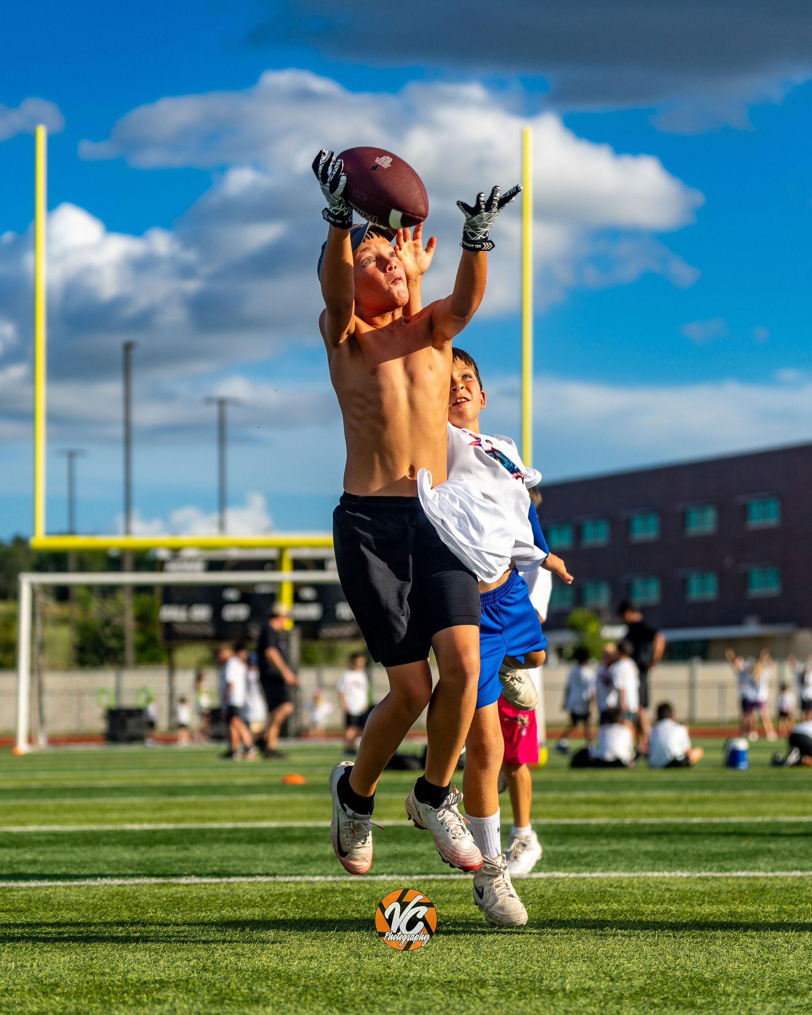 Jr Jags football and cheer June camp action photos in Buda Texas