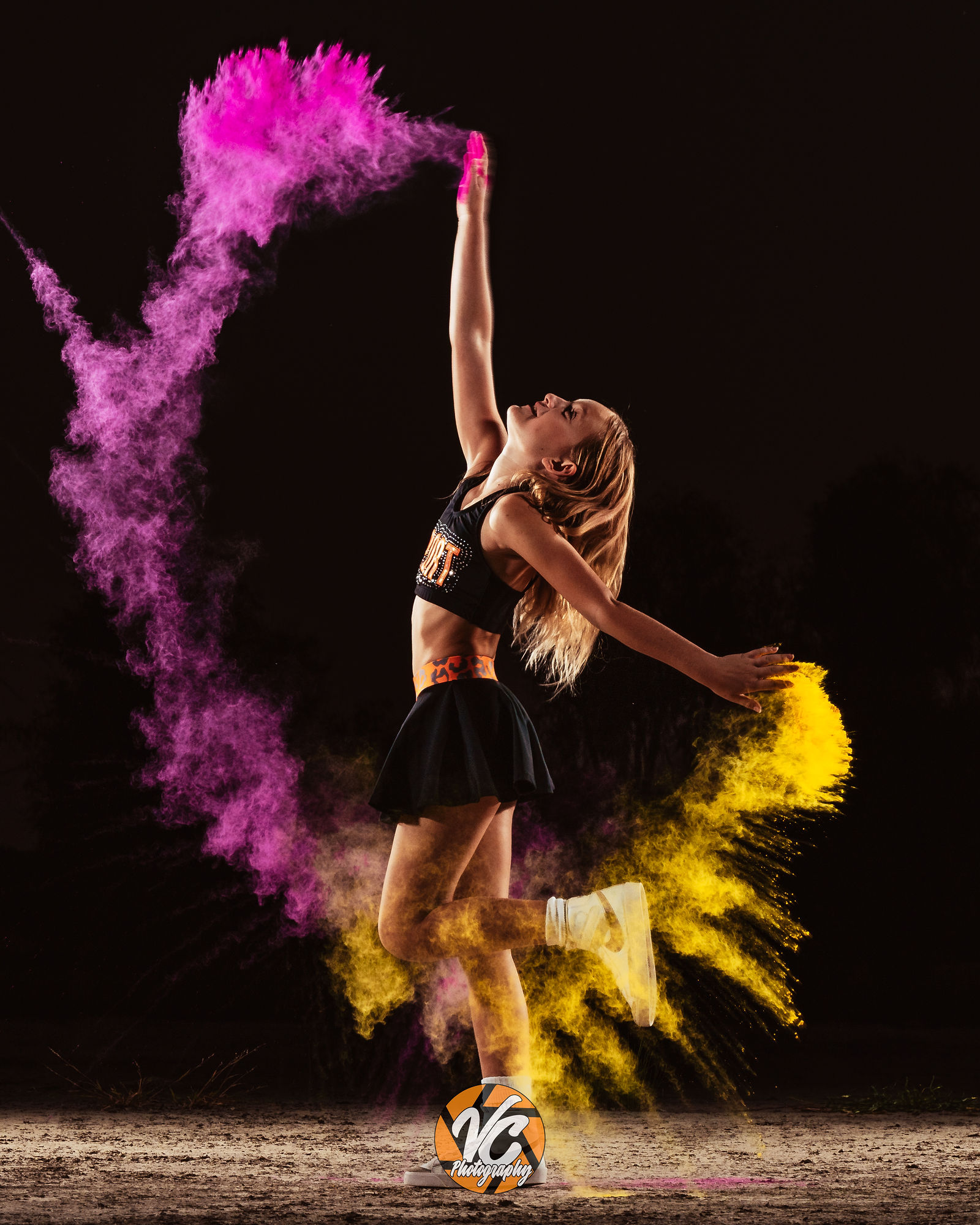Buda cheer sports portrait featuring Stella Ross and colorful powder effects