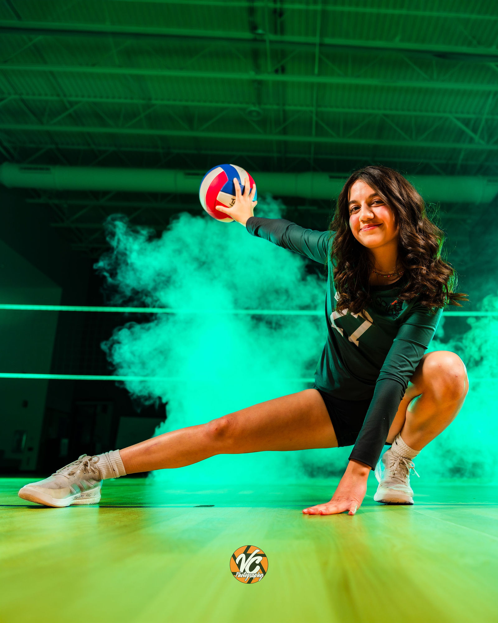 Club volleyball team media day portrait near Austin Texas with bold sports lighting