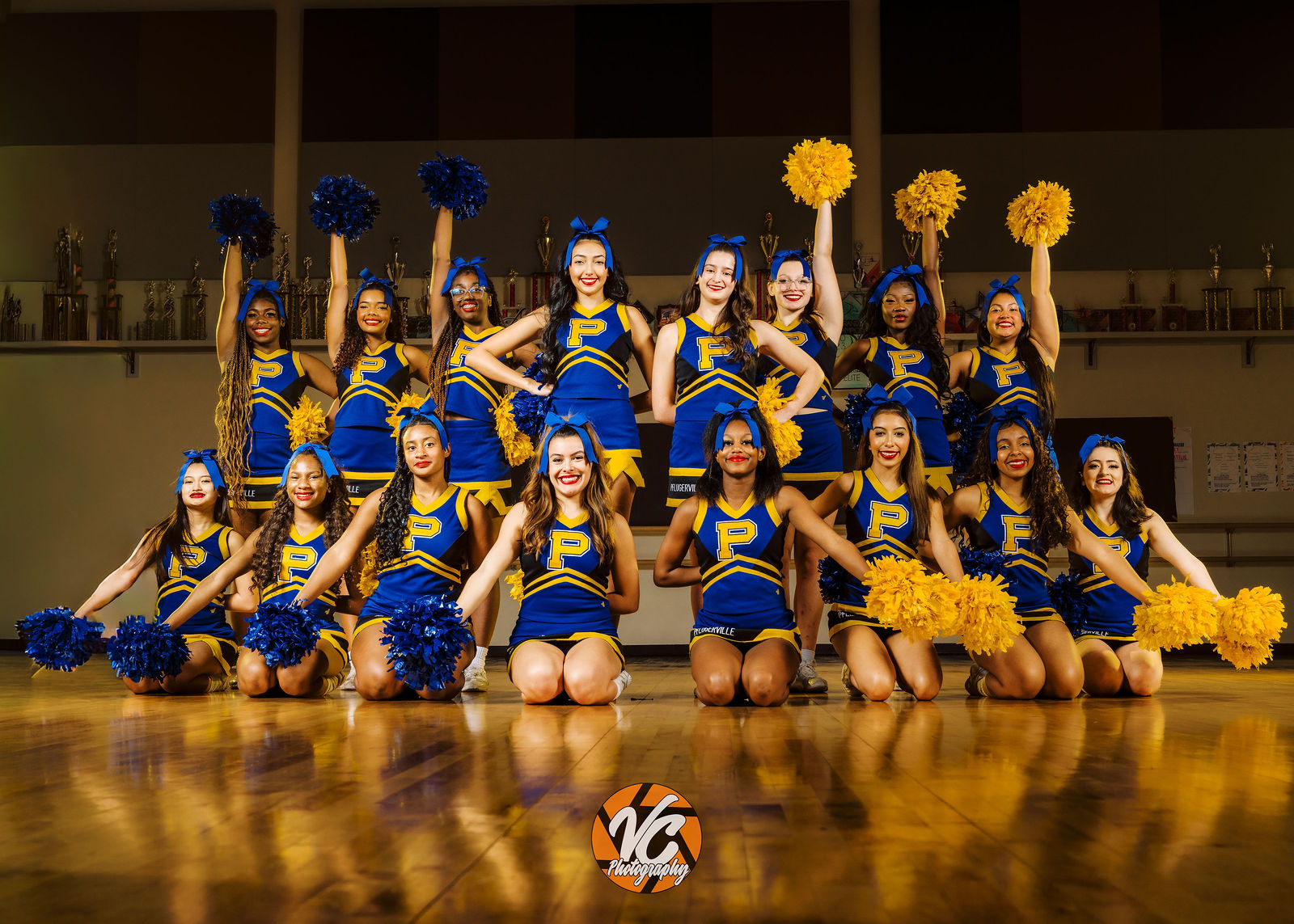 Pflugerville Cheer media day portrait at Pflugerville High School Gym by VC Photography
