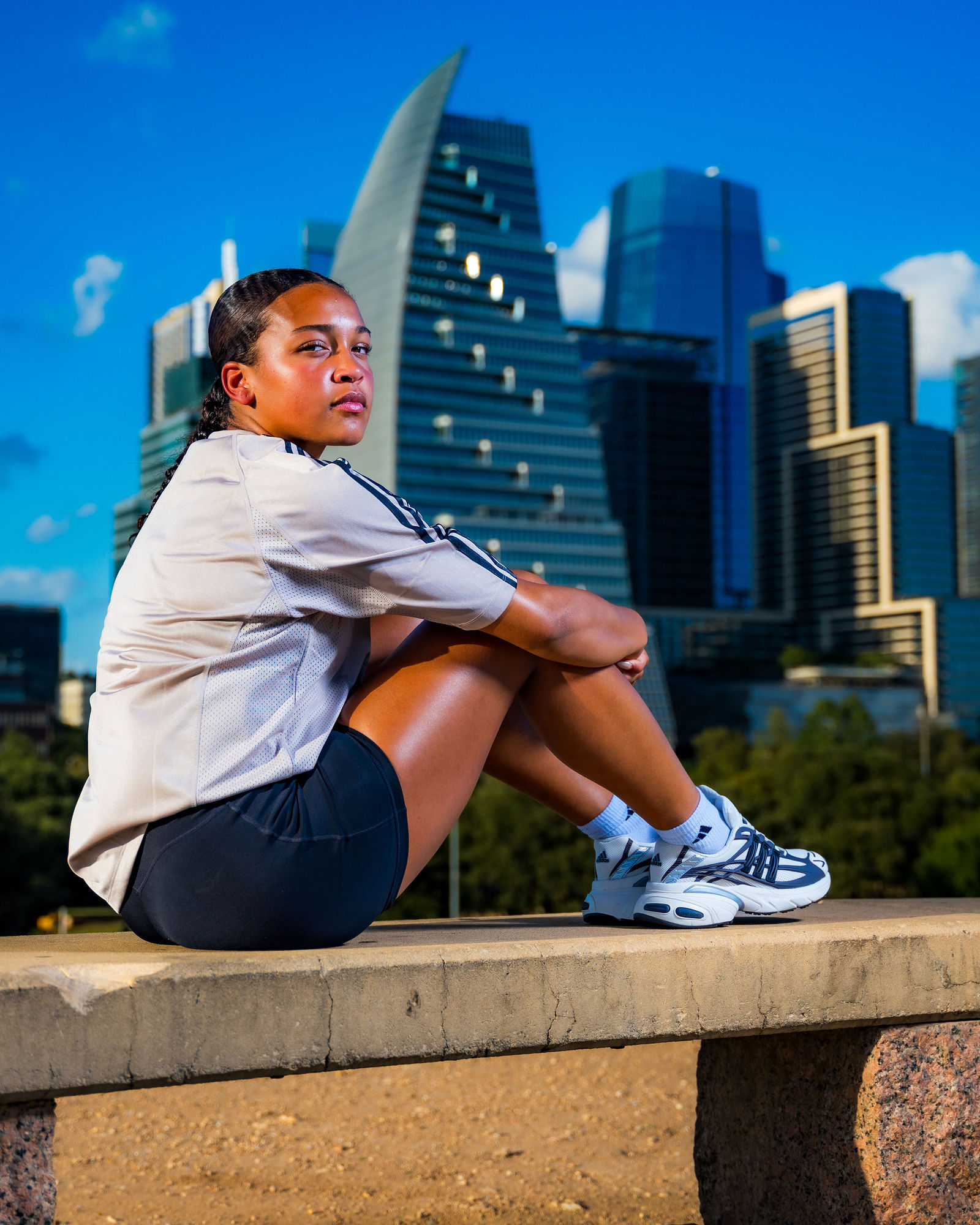 Soccer athlete finishing an Austin Adidas branding session in direct evening sunlight at Butler Metro Park